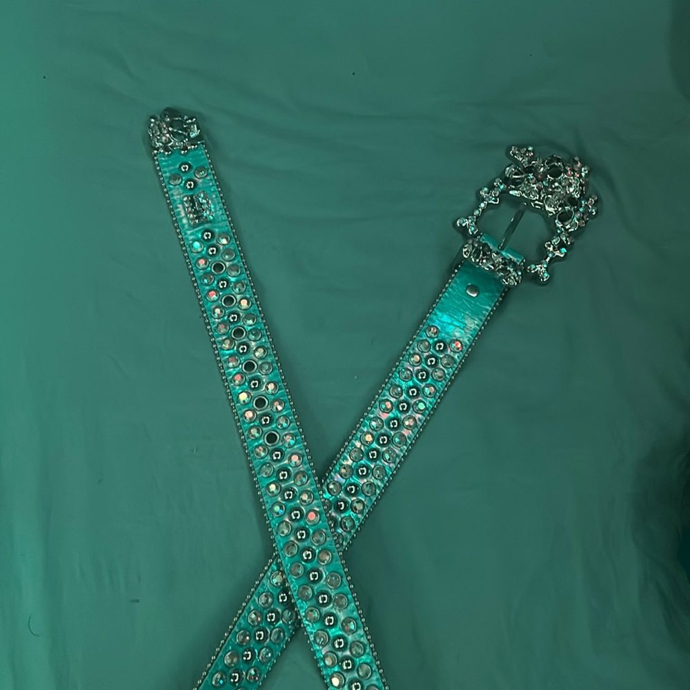 B.b simons light blue belt with skulls